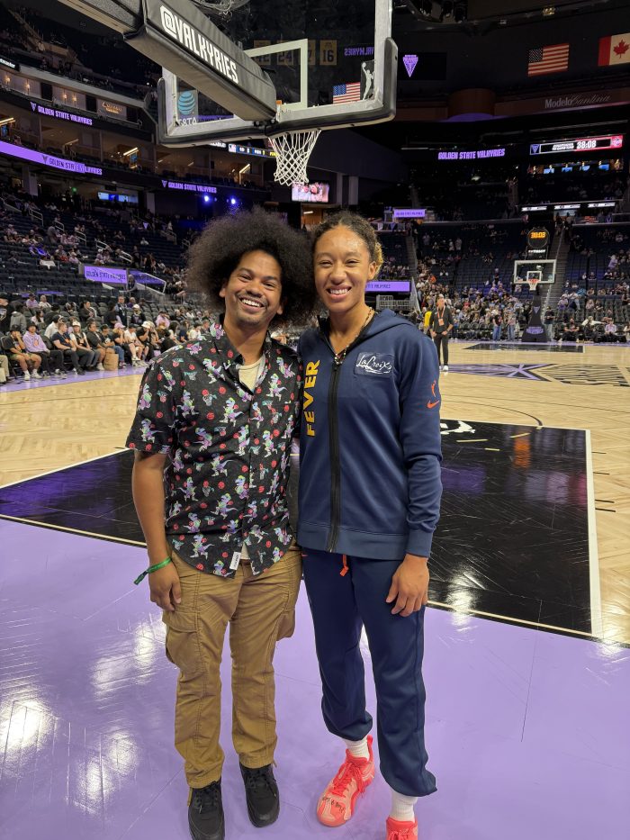 Mychal Threets (left) with Indiana Fever guard Aerial Powers in 2025.