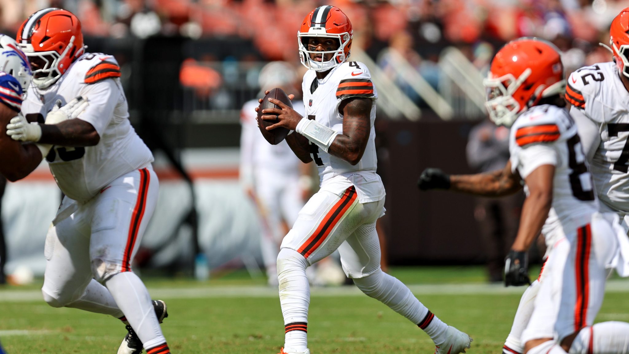 Deshaun Watson steps back in the pocket to pass.