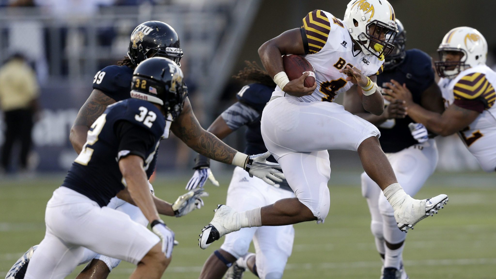 Bethune-Cookman running back Anthony Jordan leaps in the air as he runs during a game against Florida International on Sept. 14, 2013, in Miami.