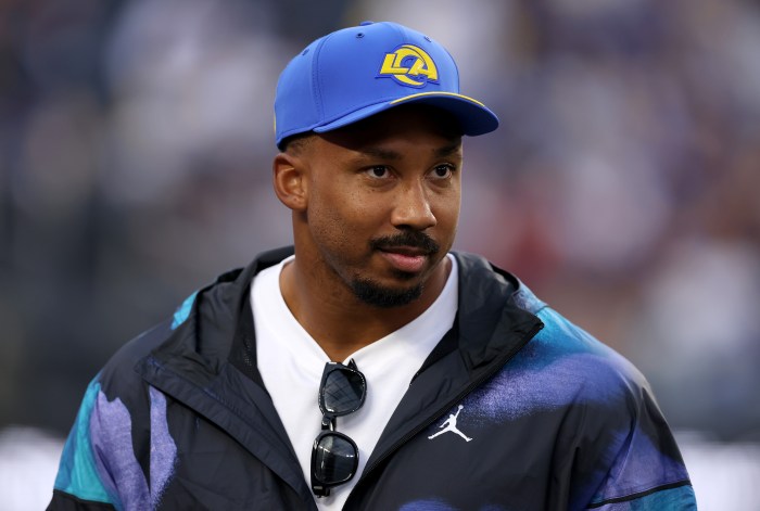 Myles Garrett watches from the sidelines.