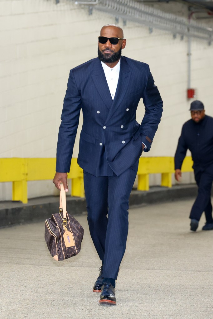 LeBron James arrives to the arena before the game