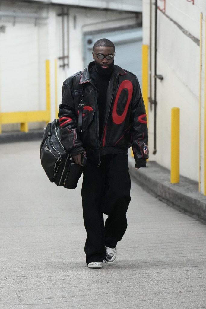 Jaylen Brown arrives to the arena before the game