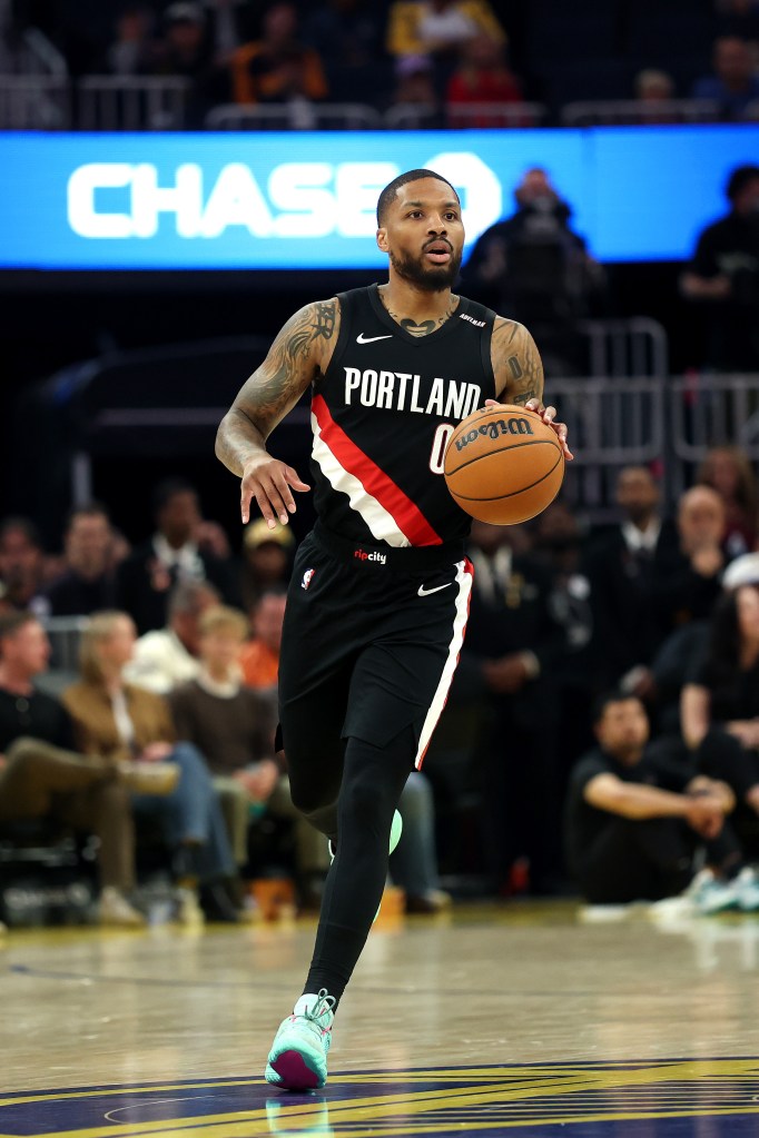 Damian Lillard brings the ball up the court.