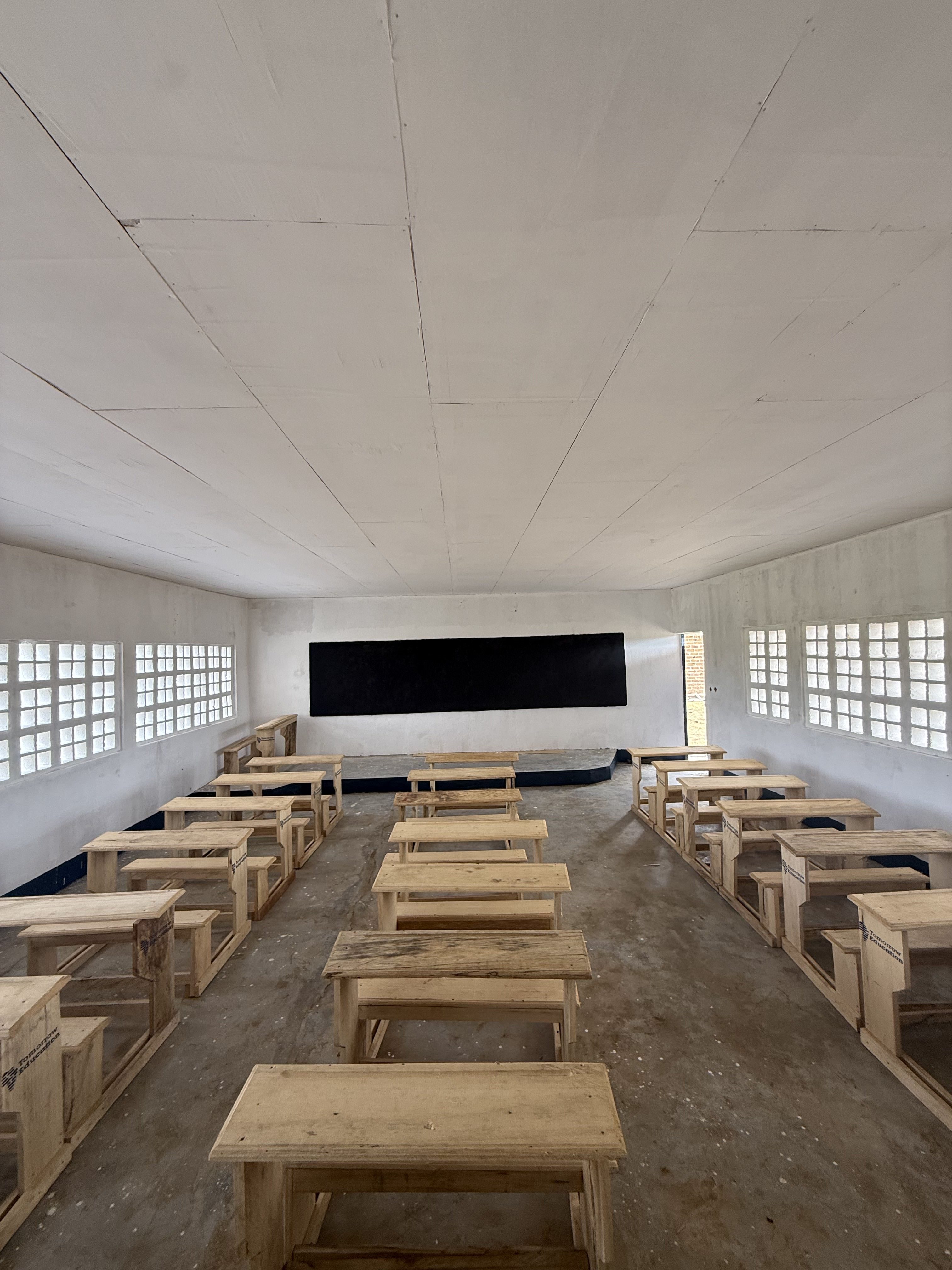 Classroom and chalkboard wall of new school