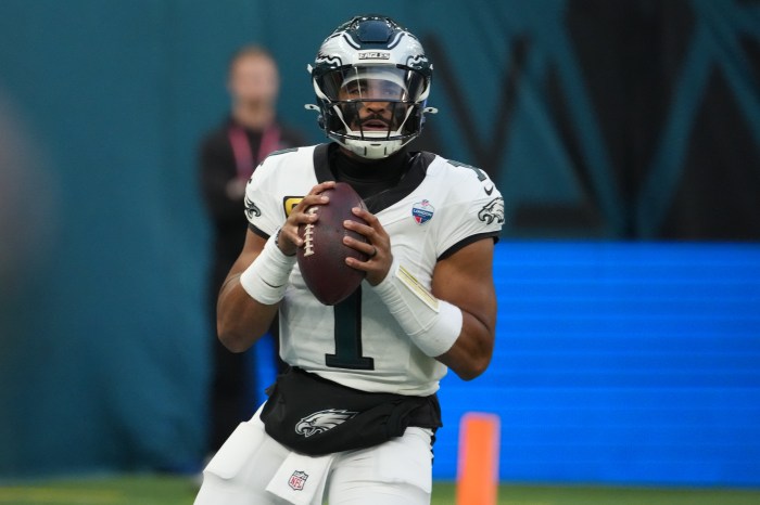 Jalen Hurts drops back to pass